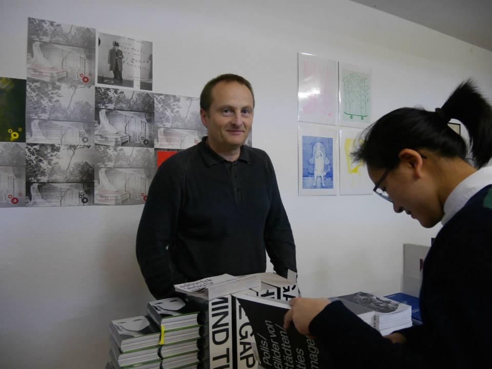 Publisher edition fink and his book stand