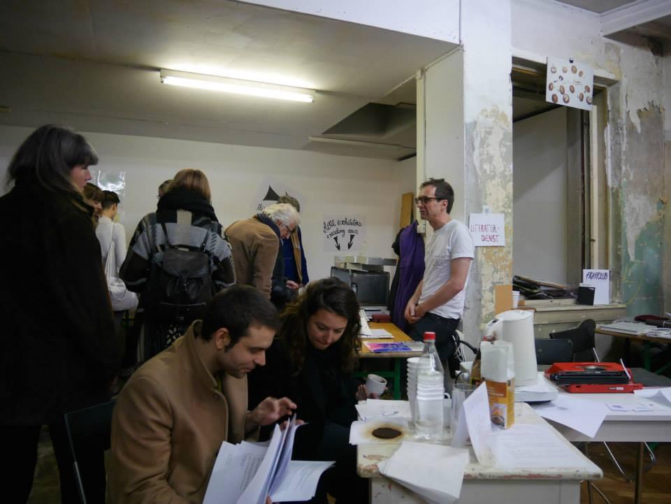 Room full of people looking at books