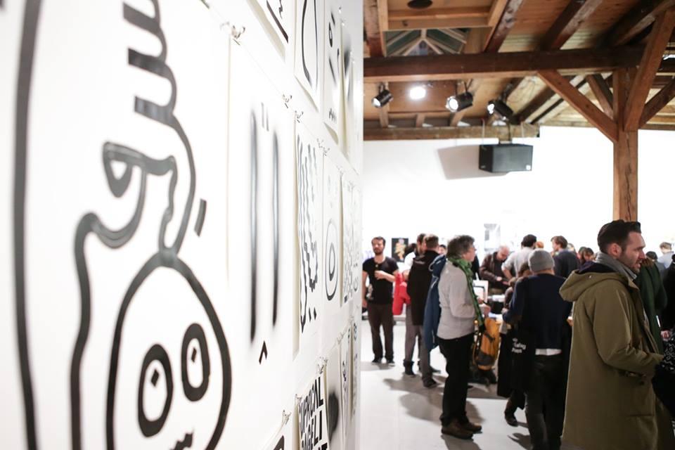 © Spyros Paloukis Picture of the room full with people and book stands