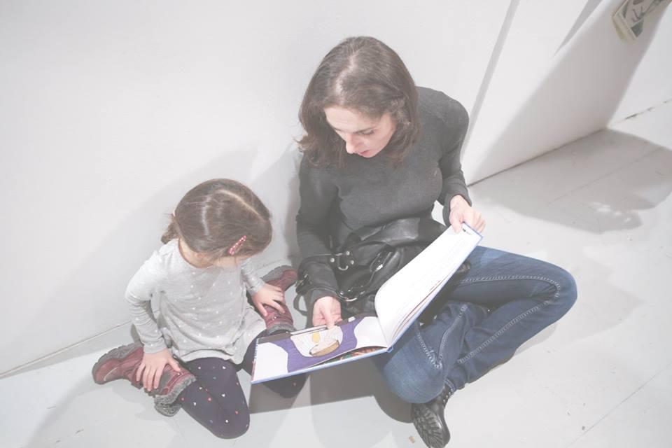 © Spyros Paloukis Mother and child looking at a book together