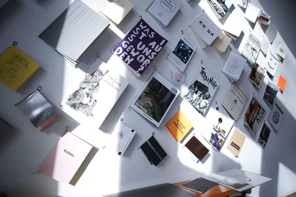 © Spyros Paloukis Wall with publications hanging on it