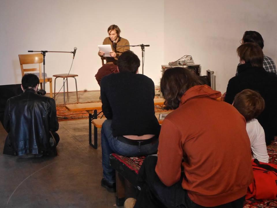 People listening to a reading