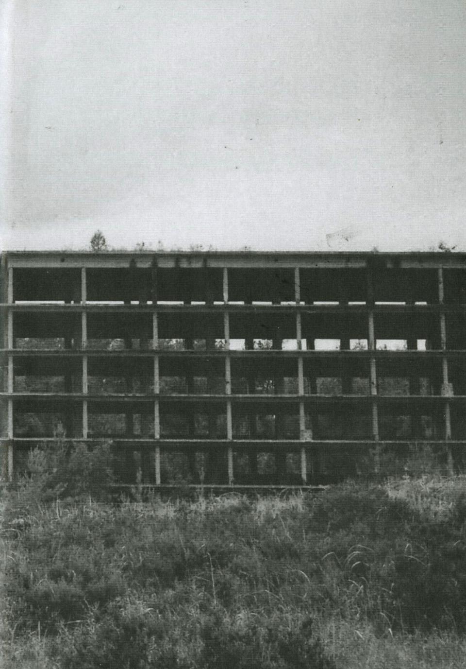 Black and white photograph of industrial building