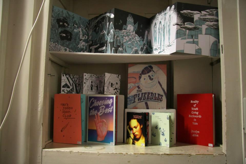 © ALF Publications exhibited on a shelve