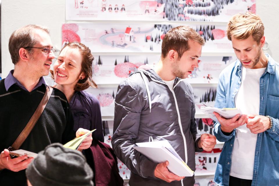 People looking at books