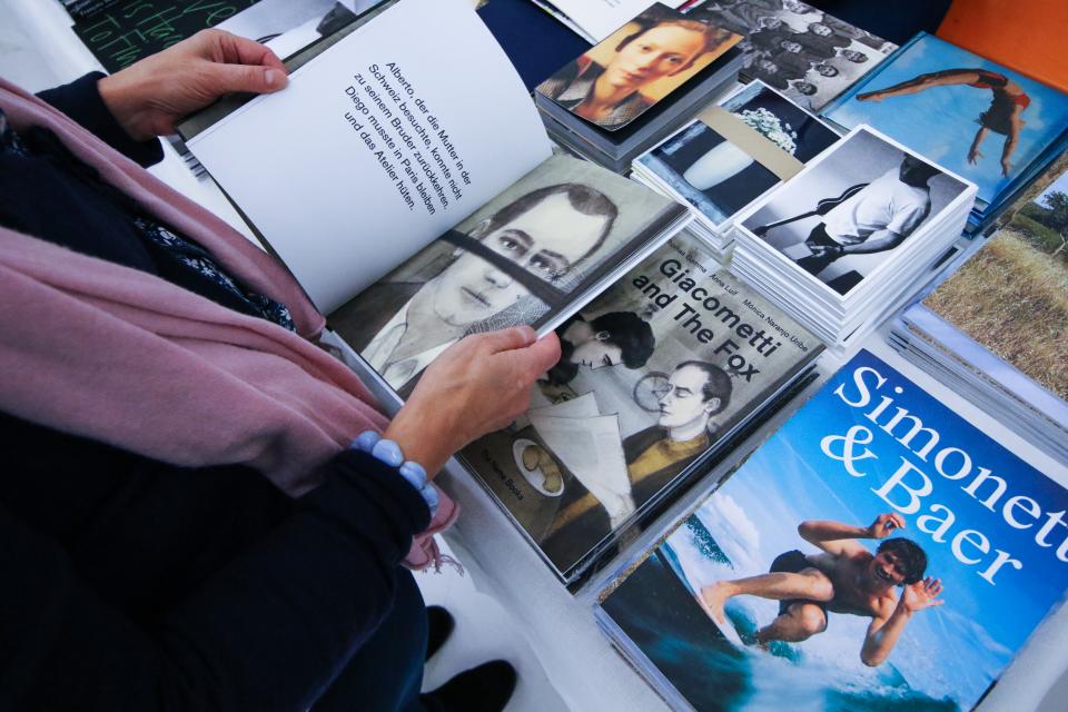 Person looking at books